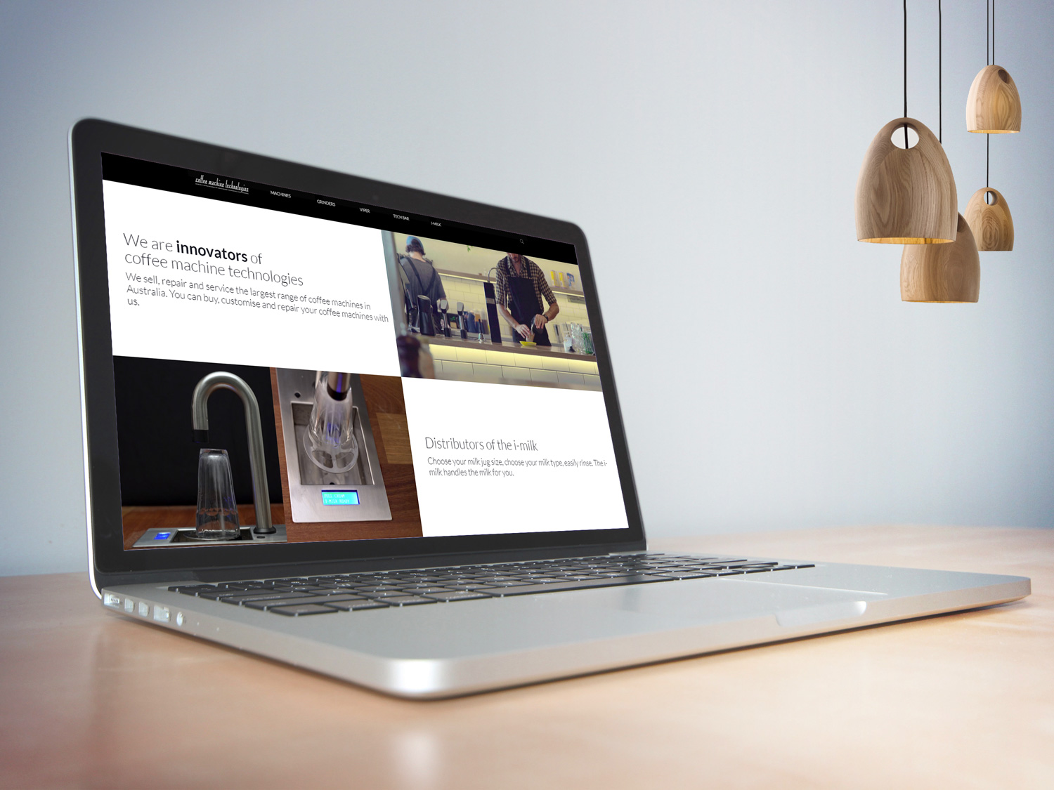 online tree laptop displaying coffee machine technologies website on screen